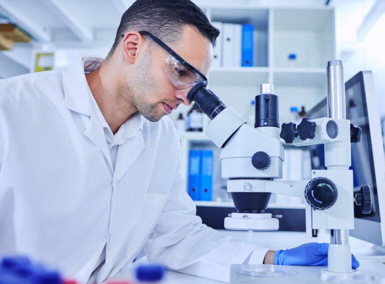 Research scientist conducting experimen with an electronic lab notebook